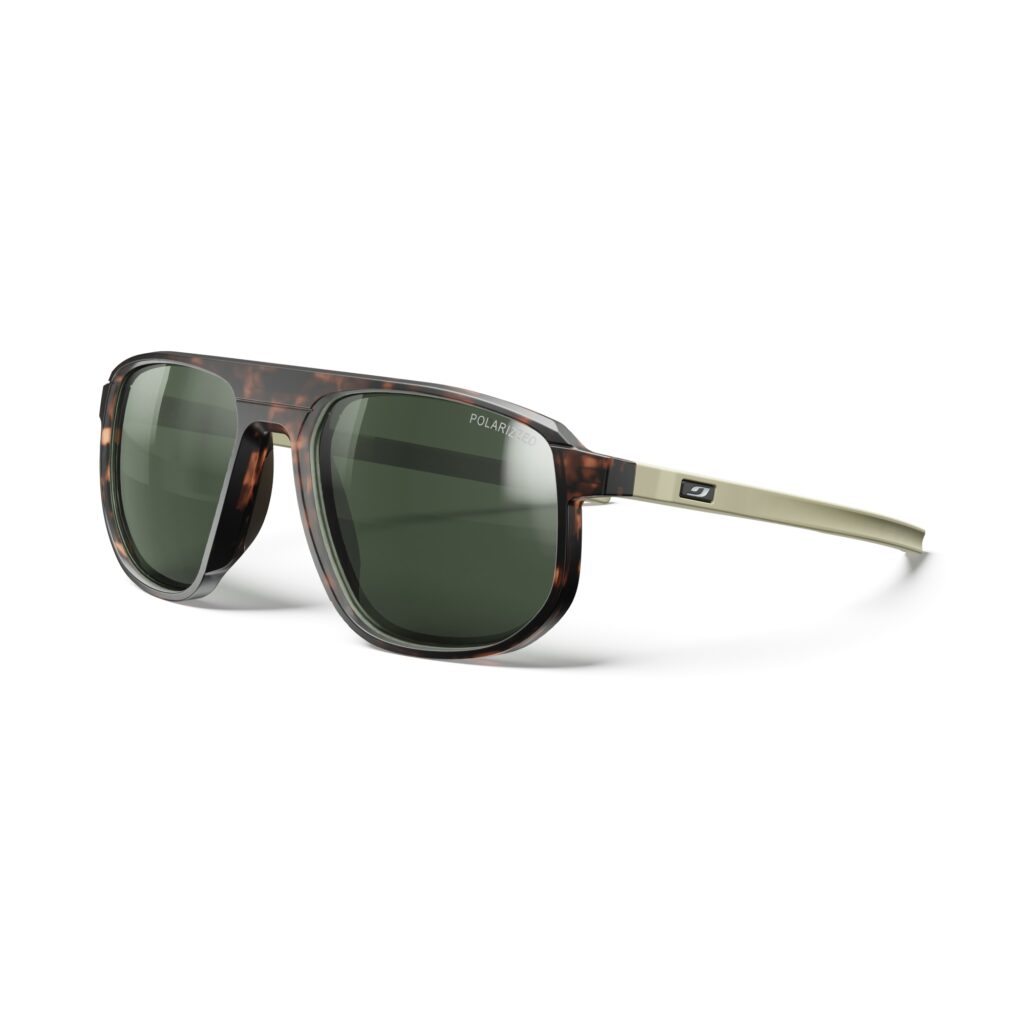 Angled front view of Julbo Ward sunglasses with tortoiseshell frame, green polarised lenses, and light-coloured arms.